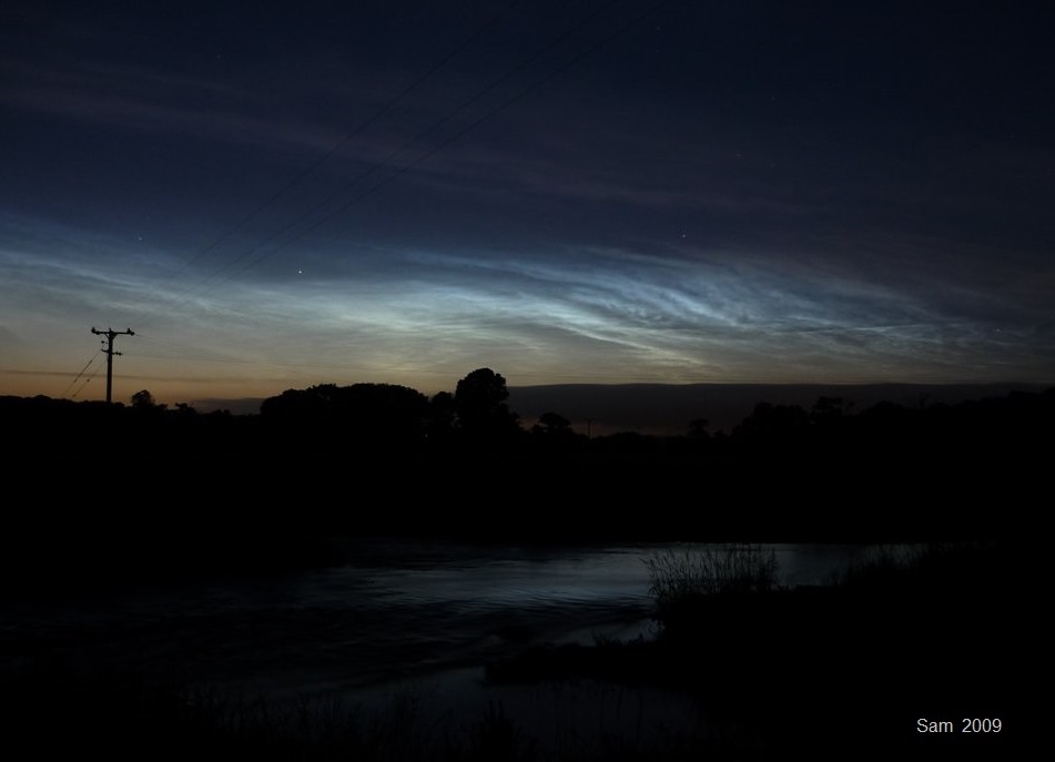 Noctilucent clouds 2009 over lake