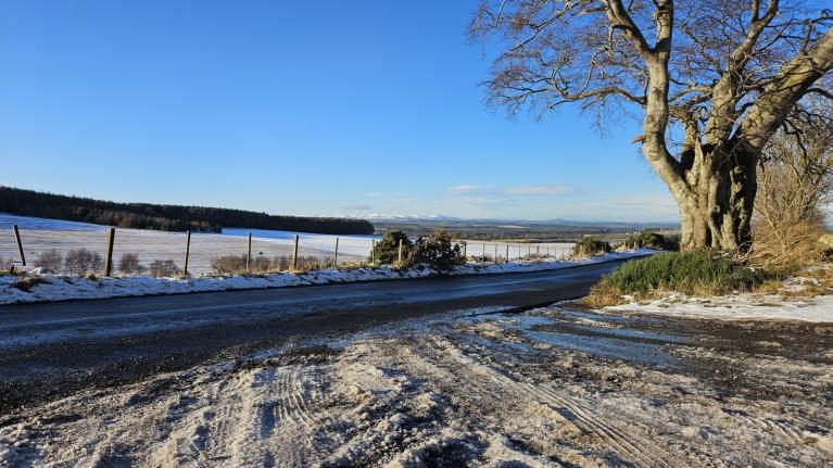 Another cold day with snow showers before a change during Friday