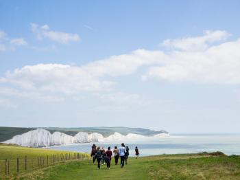 A few showers popping up but warm sunshine and bright skies before the Bank Holiday weekend