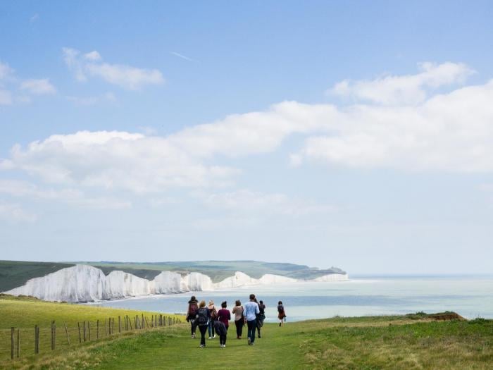 A few showers popping up but warm sunshine and bright skies before the Bank Holiday weekend