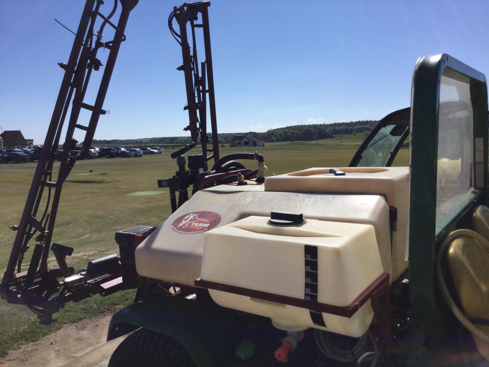 Golf course spraying machine