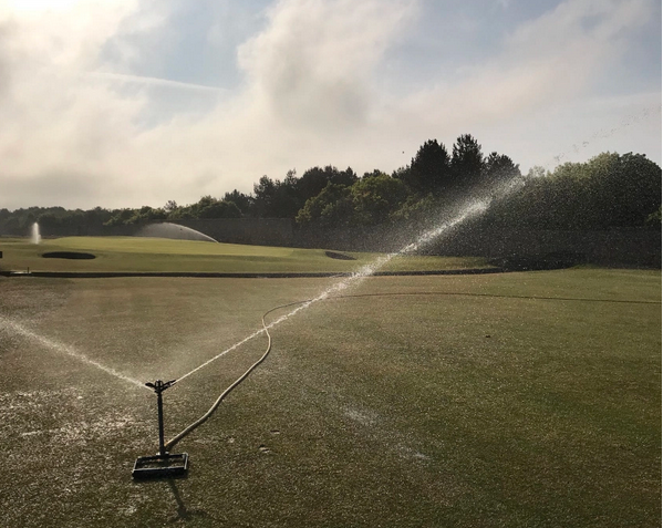 Portable water sprayers on the golf course